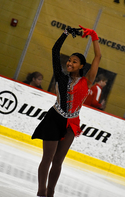 Sojie in a black and red dress